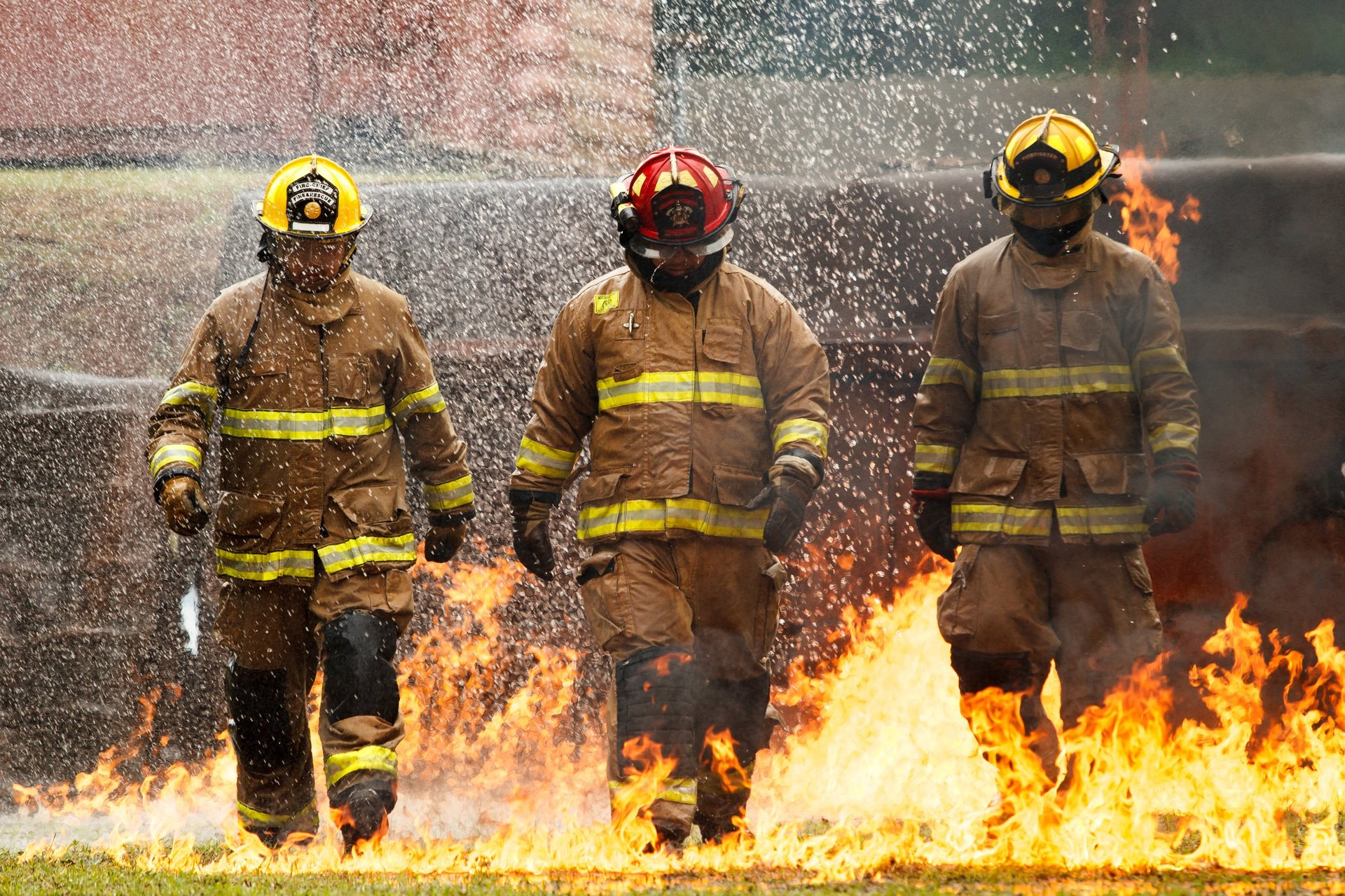 Firefighters in intense flames during training